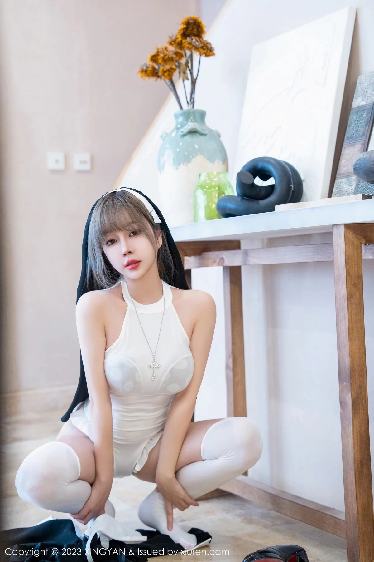 Xgyw.Org_[XINGYAN星颜社]VOL.187_女神王雨纯半脱修女服饰露白色轻透上衣配白丝袜完美诱惑写真75P
