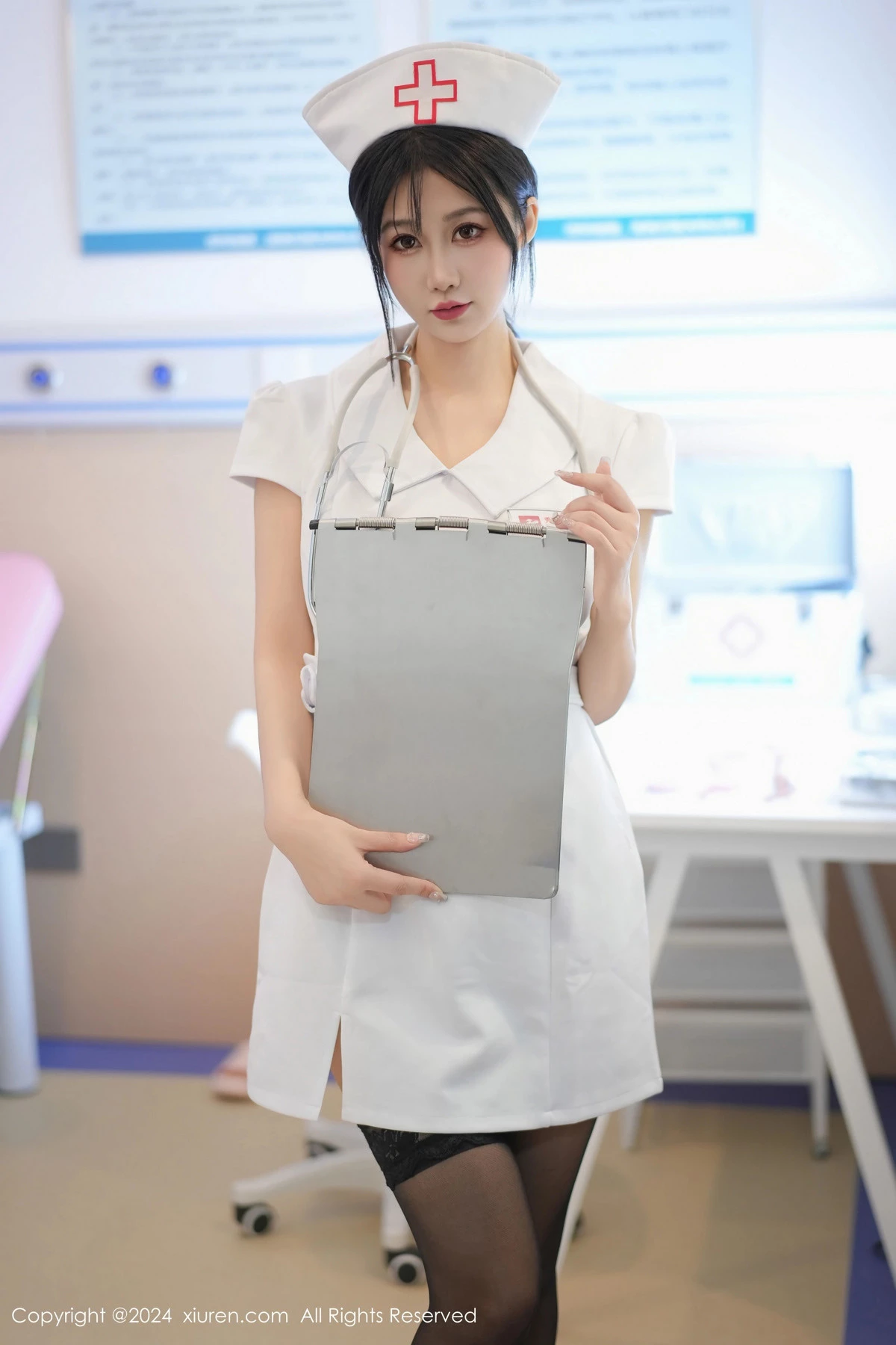 Xgyw.Org_XiuRen第8512期_模特laura阿姣性感白色护士服配黑丝袜半脱秀豪乳翘臀诱惑写真87P